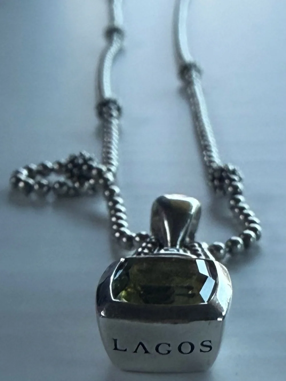 LAGOS 18k and .925 Peridot Caviar Pendant with 18” Silver Chain, HARDLY WORN!